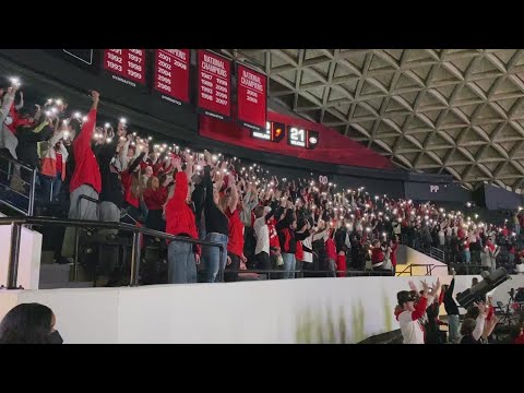 Georgia students flash their phone lights to cheer on Bulldogs