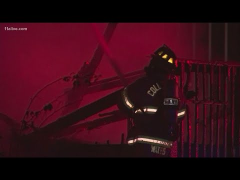 Rooming house goes up in flames with 15 people inside