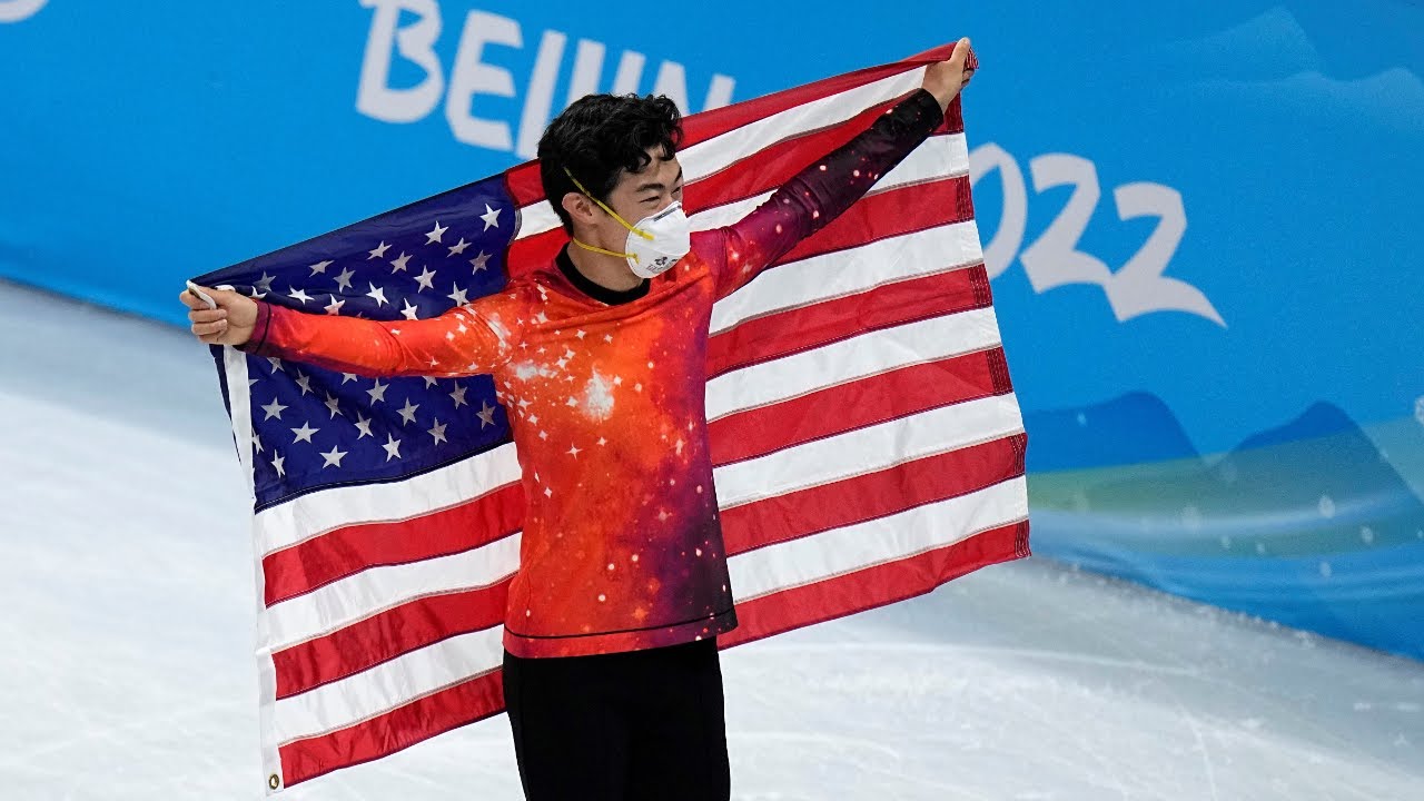 Nathan Chen reacts to winning gold medal in Olympic figure skating