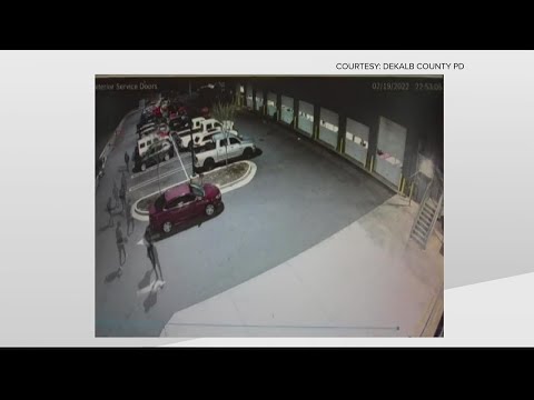 New surveillance video shows men wanted for murder of security guard