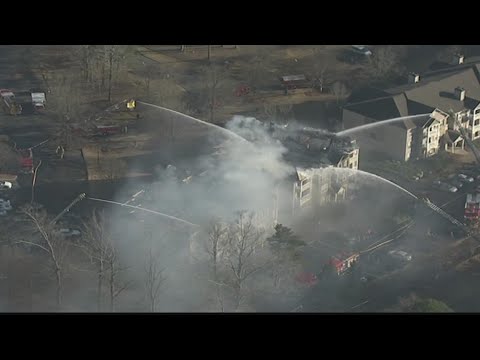 Firefighters continue to combat fire that ripped through Dekalb County apartments
