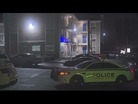Gunshot fired from outside hotel room kills woman inside, Gwinnett police say