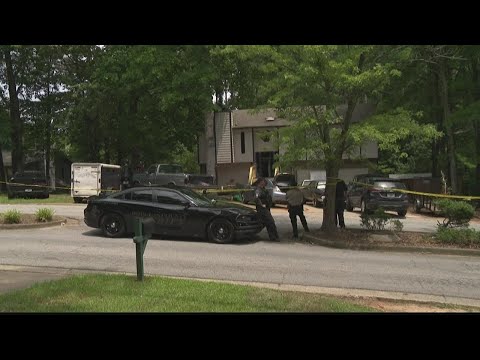 Crime scene tape blocks road as deputies investigate Douglas County shooting