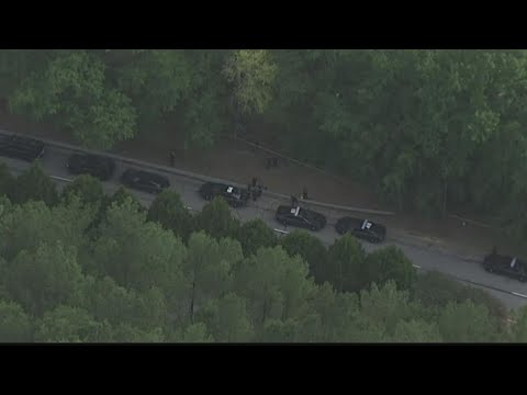 Police: Man found shot to death in woods near Georgia International Horse Park in Conyers, 1 detaine