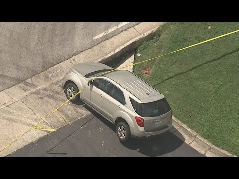 Aerials | SUV seemingly stuck in Georgia sinkhole