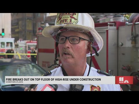Fire chief speaks after roof of Atlanta high-rise catches fire