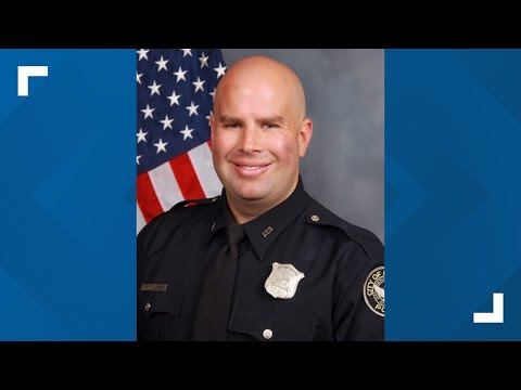 APD officer pointed gun, yelled racial slurs during road rage incident, family says