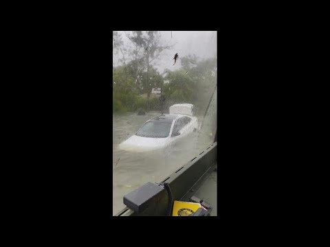 Woman stuck in flooded car during Hurricane Ian rescued by Naples Fire