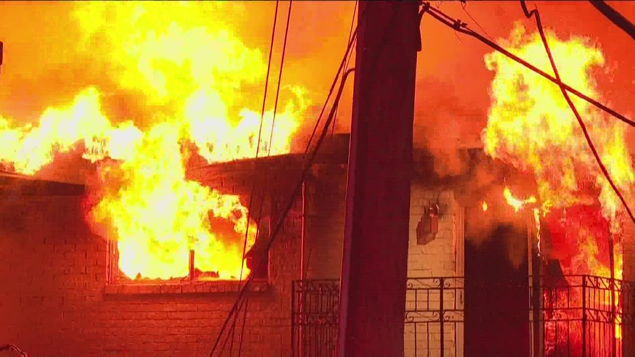 Crews monitoring hotspots after fire at vacant Midtown building