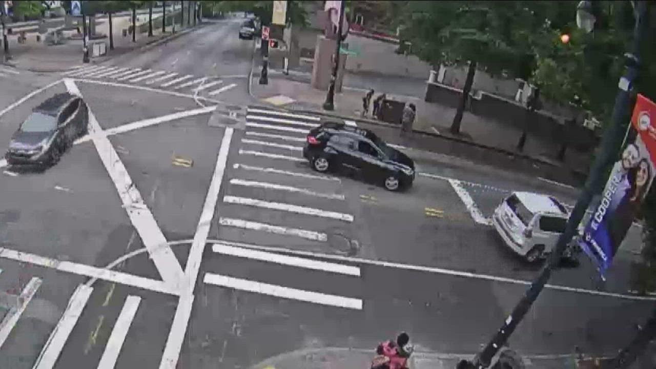 Video shows alleged hit-and-run driver move victim to sidewalk before leaving scene