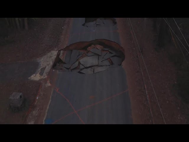Drone video shows large truck swallowed by South Fulton sinkhole
