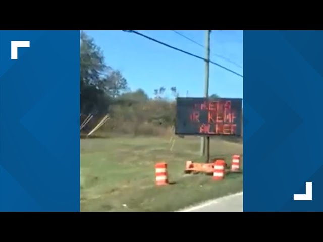 GDOT contractor uses traffic sign to voice support for Kemp, Walker