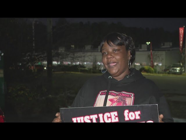 Vigil held for Eric Holmes, mother demands justice