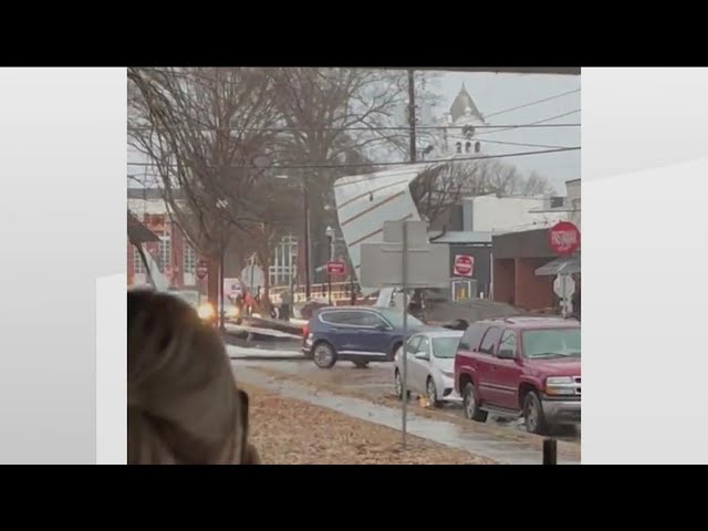 Awning torn off building in McDonough Square during storm