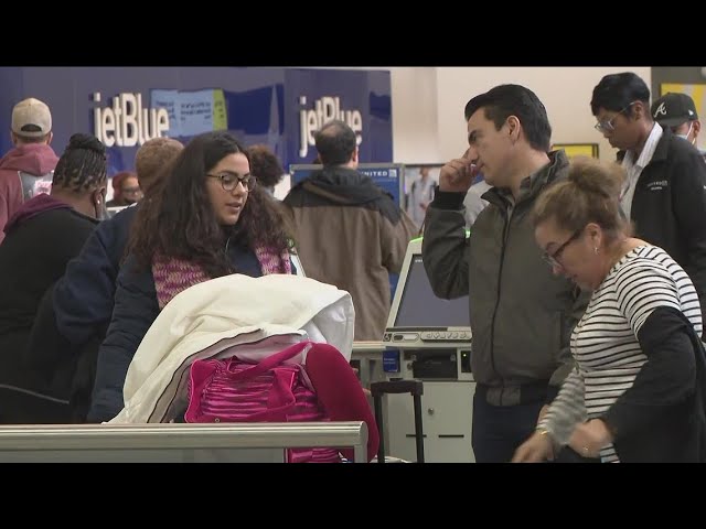 Delays continue at Atlanta airport after flights grounded; travelers react