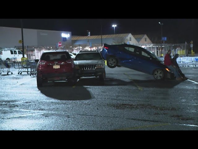 Cars flipped over in Walmart parking lot in Griffin