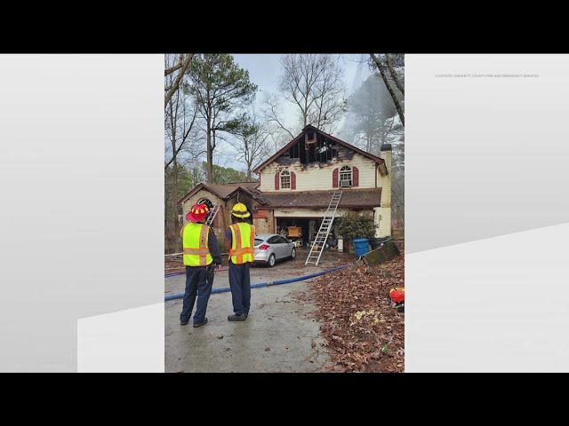 Homeowner, dog helped out of burning home