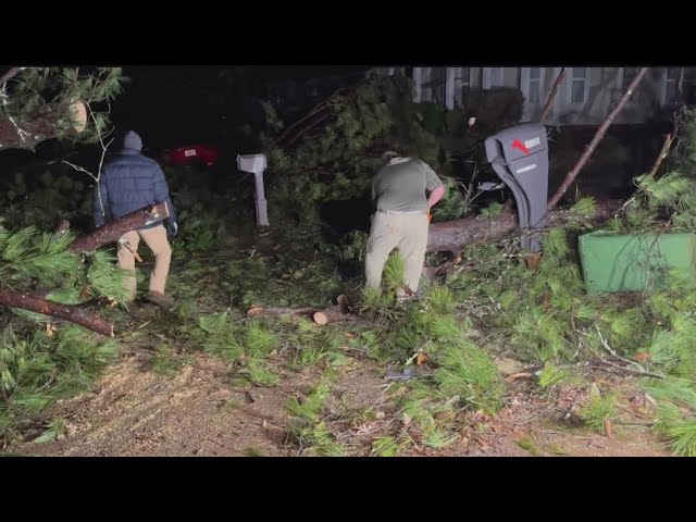 Residents work to clear debris in Griffin
