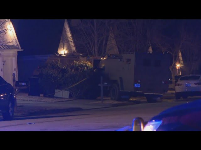 Police continue to investigate double shooting, armored vehicle spotted nearby