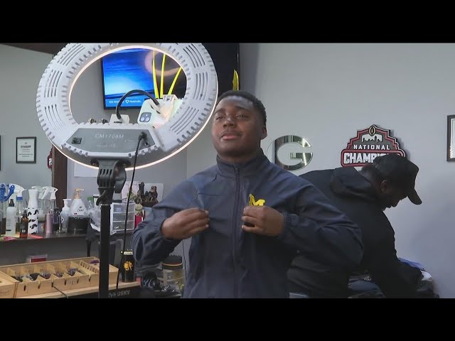 Buford High School star Mantrez Walker creatively commits to Michigan at barber shop